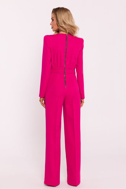 Sophisticated women's jumpsuit featuring a fitted top with long sleeves, shoulder pads, slightly wide-leg pants, and a decorative back zipper, crafted in Poland for a modern and elegant look.






