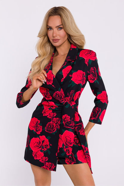 Elegant printed short jumpsuit featuring a stylish jacket collar, jacket-style front, adjustable side tie, and concealed zipper, crafted in Poland for comfort and sophistication.






