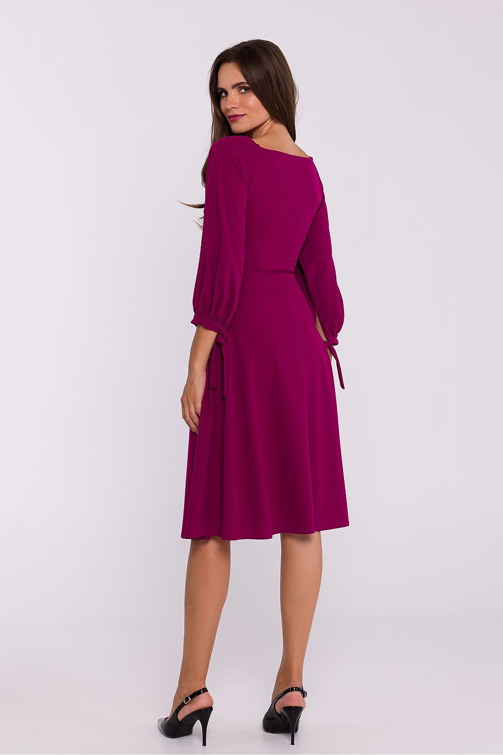 Romantic Knit Dress with V-Neck, Adjustable Buffeted Sleeves, and Envelope Cut