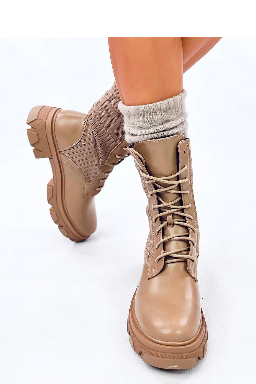 Bottes pour femmes avec semelle haute et tige en chaussette élastique en cuir écologique et tissu