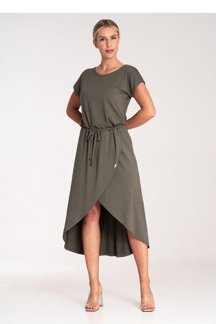 An asymmetrical dress featuring an overlapping neckline, short sleeves, and a stylish waist tie, ideal for various occasions.






