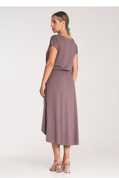 An asymmetrical dress featuring an overlapping neckline, short sleeves, and a stylish waist tie, ideal for various occasions.






