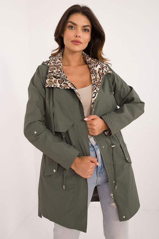 A versatile women's transitional jacket made of durable polyester, featuring long sleeves, a practical zipper closure with snaps, and a detachable hood. Designed with a fashionable animal motif lining, slip pockets, and a lightweight, unpadded design, it's perfect for the fall and winter seasons, offering comfort and style for varying weather conditions.






