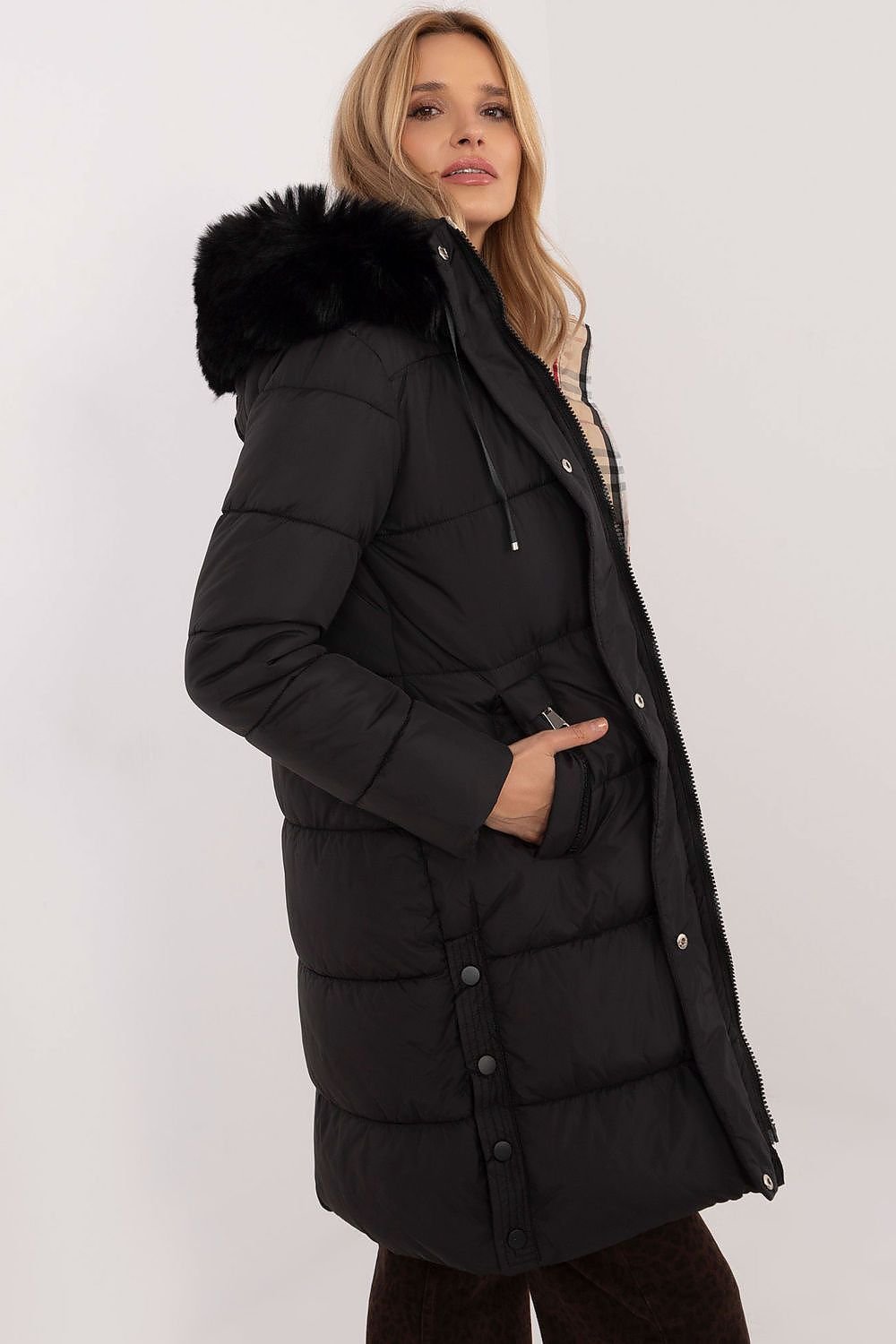 A cozy quilted winter jacket with an extended cut, featuring a smooth pattern, polyester fabric, and synthetic fill for warmth. The detachable hood and fur add style and versatility, while slip pockets, a zipper closure, and additional snaps offer comfort and protection from the cold. Perfect for everyday outings and work during the autumn/winter season.






