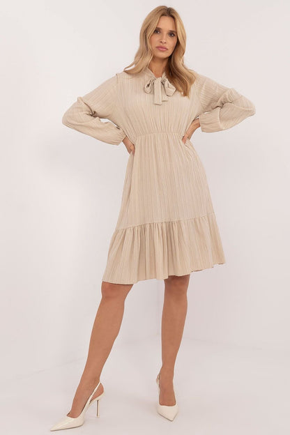 Flared Everyday Dress with Tied Neckline, Long Sleeves, and Ruffle Detail