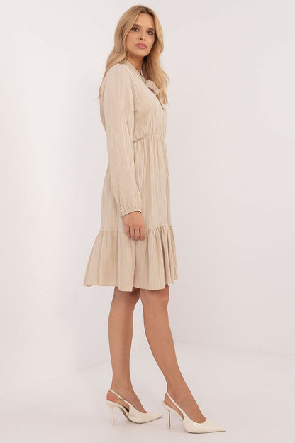 Flared Everyday Dress with Tied Neckline, Long Sleeves, and Ruffle Detail