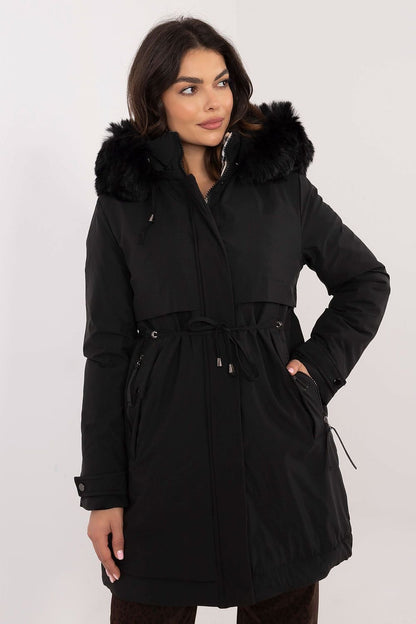 A stylish quilted jacket made of high-quality polyester with synthetic down filling, featuring a detachable fur collar, waist belt, and side zippered pockets. Ideal for colder days, offering comfort, warmth, and a modern design.
