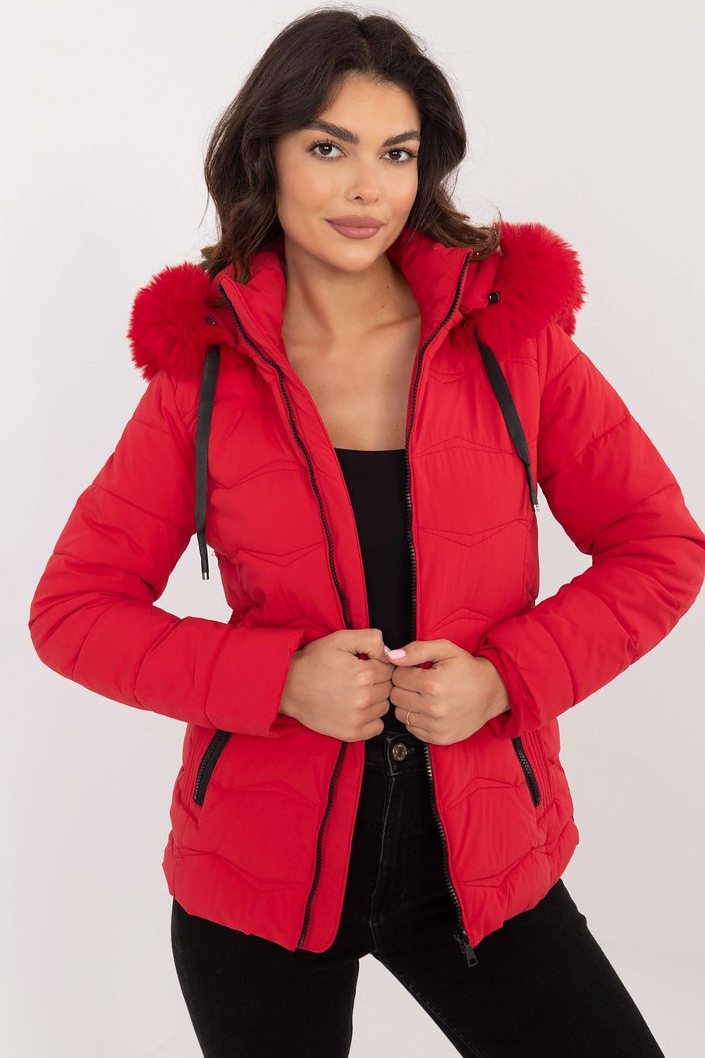 A stylish, high-quality quilted jacket made from polyester and filled with synthetic down for warmth and comfort. Featuring a short length, zipper closure, and detachable hood with drawstring closure, it provides protection from wind and rain. Side zippered pockets offer practicality, while the universal plain pattern ensures versatility for various styles.