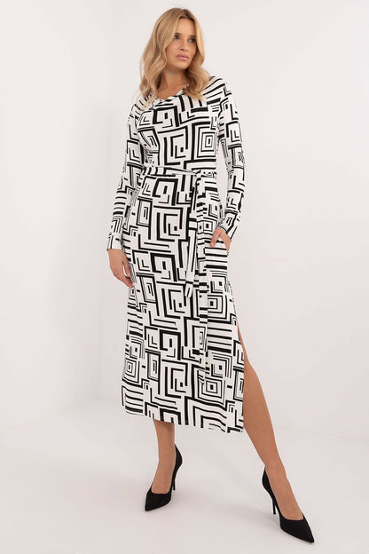 Stylish midi pencil dress with a modern geometric pattern, long sleeves, flowing neckline, and waist tie belt, offering a comfortable and elegant fit for work, parties, and daily wear.