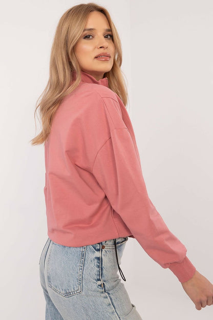  Classic women's casual sweatshirt made from high-quality cotton with elastane, featuring a zippered collar, long sleeves, and a smooth design for everyday wear. Offers comfort, softness, and a modern sporty touch.