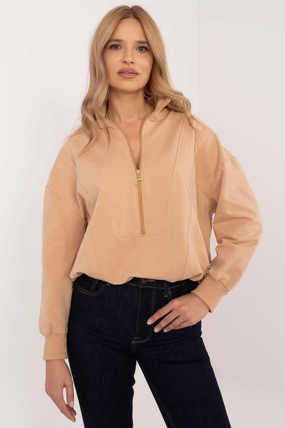  Classic women's casual sweatshirt made from high-quality cotton with elastane, featuring a zippered collar, long sleeves, and a smooth design for everyday wear. Offers comfort, softness, and a modern sporty touch.