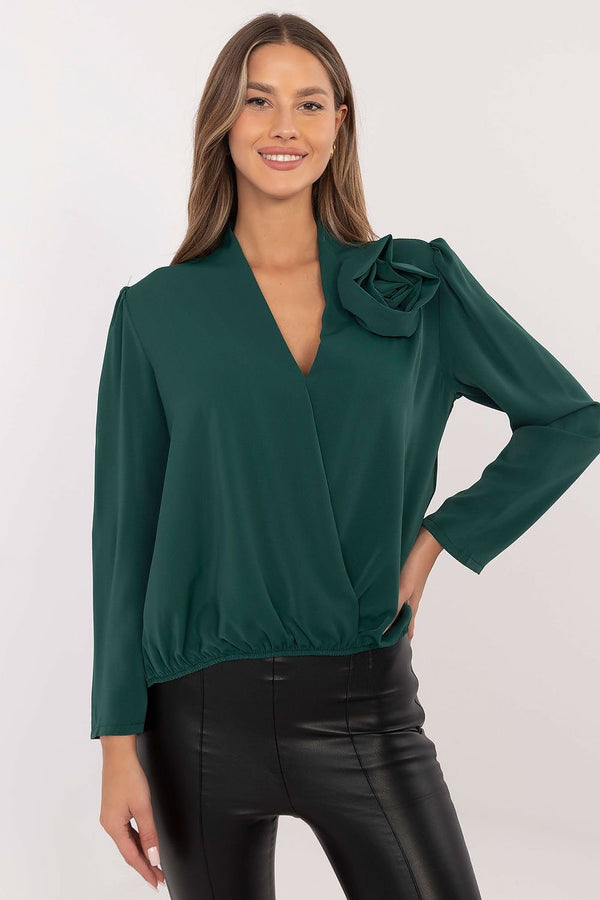 Elegant Blouse with Decorative Flower and Subtle Neckline Detail