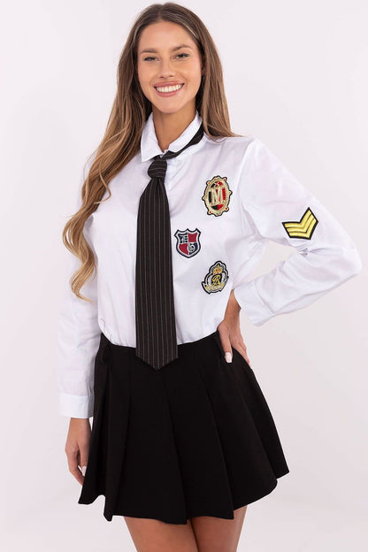 Stylish women's shirt made from a cotton and elastane blend, featuring a classic collar, button-down design, and removable tie for versatile styling. Decorative patches on the front and sleeves add a unique, fashionable touch