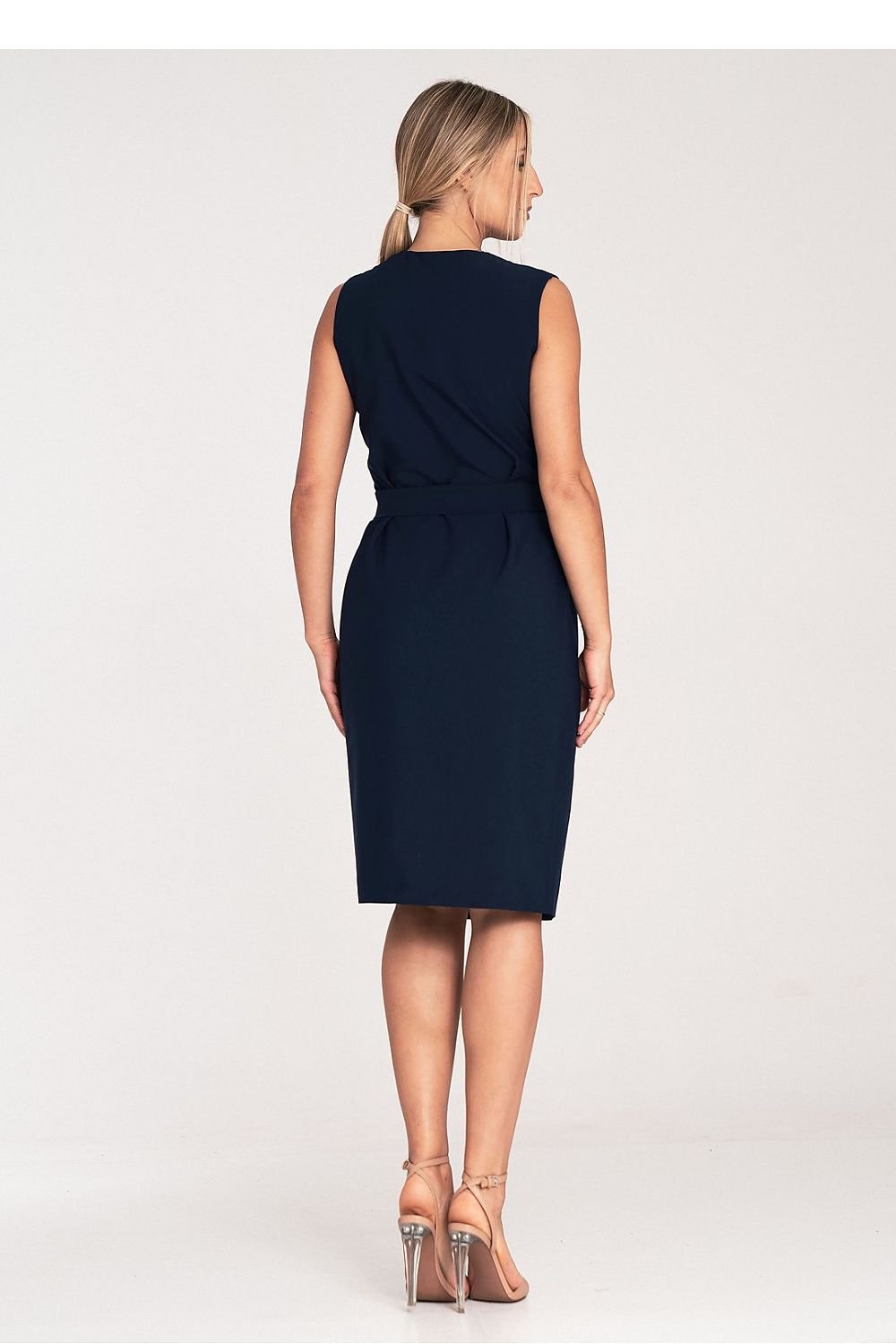 A sleeveless midi pencil dress featuring a wrap neckline, no pockets or lining, and a belt with a decorative golden metal buckle for a sleek and elegant look.


