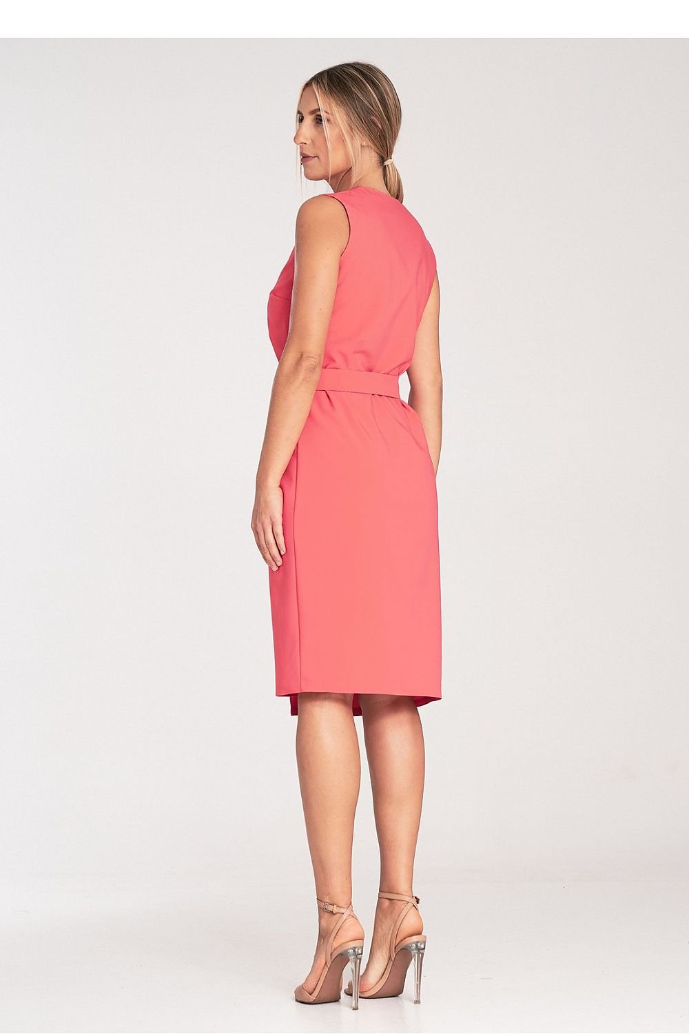 A sleeveless midi pencil dress featuring a wrap neckline, no pockets or lining, and a belt with a decorative golden metal buckle for a sleek and elegant look.


