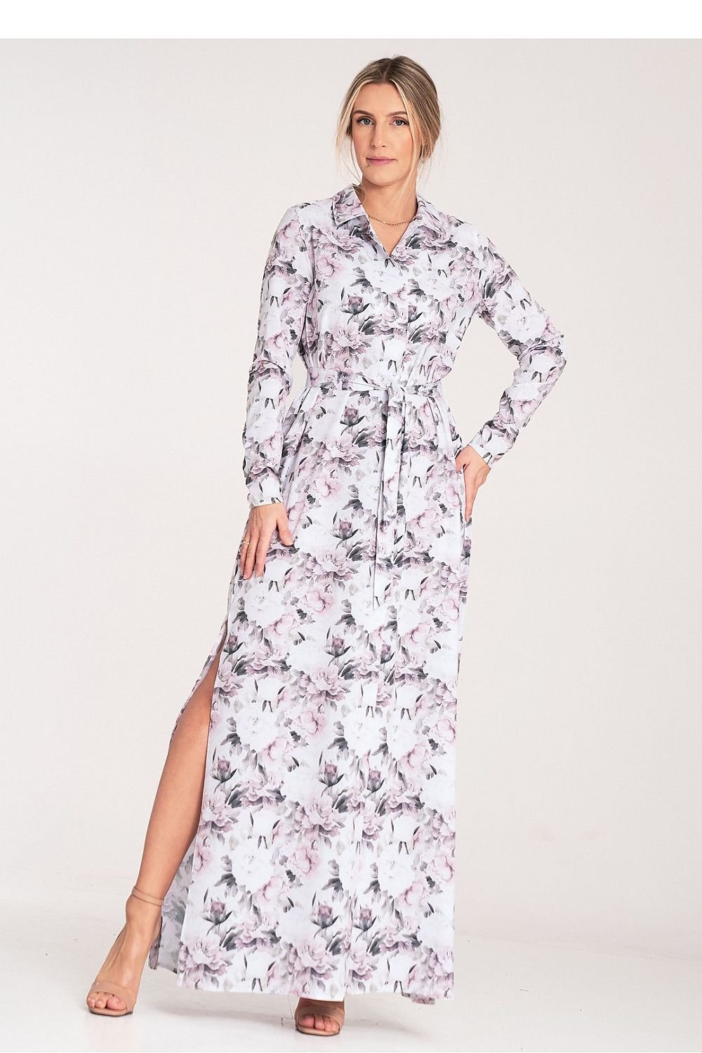 Elegant floral dress made from lightweight material, designed with a buttoned-up closure and a tied waist.