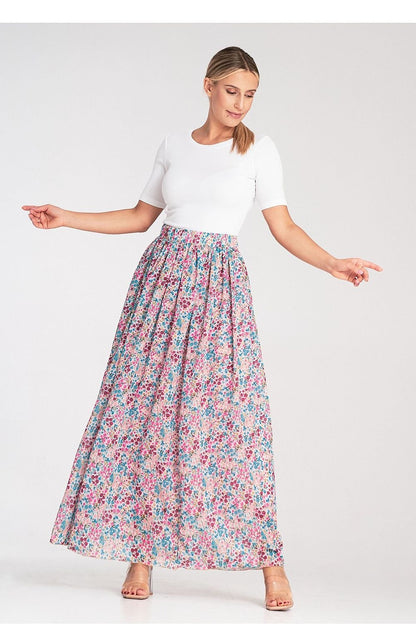 A long, flared skirt made of striking fabric with a crinkled waist and lined with 100% viscose for added comfort.

