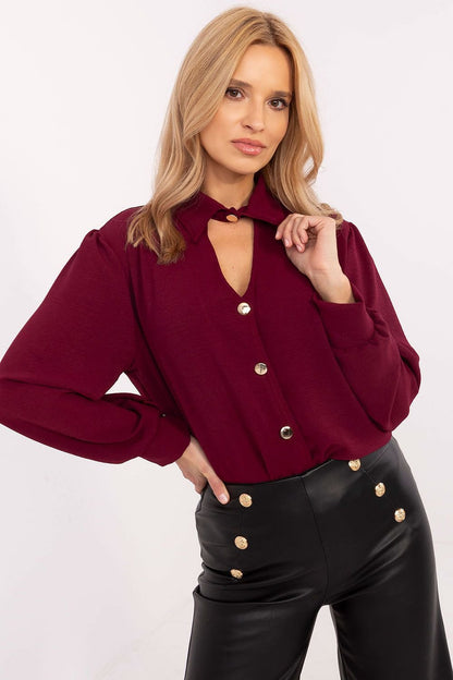 A timeless women's shirt made from a high-quality blend of polyester and elastane, featuring long, slightly buff sleeves for a romantic touch. The minimalist design, with a button closure, ensures both comfort and elegance, making it ideal for formal occasions, the office, or meetings. Perfect for pairing with classic pants or skirts.






