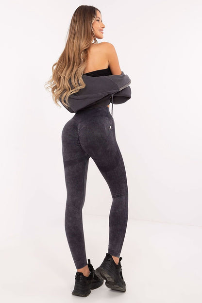 Legging de sport au design moderne avec ceinture asymétrique et détails sculptants