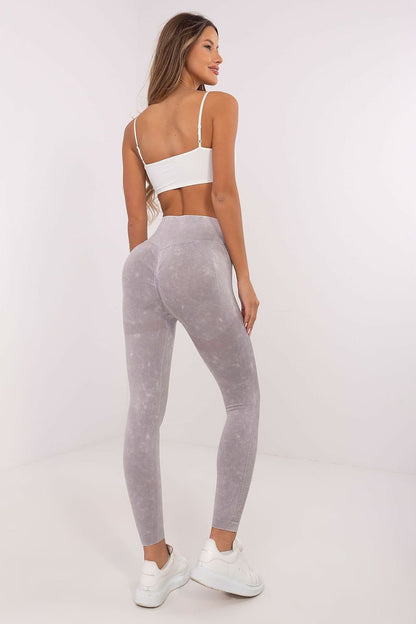 Legging de sport au design moderne avec ceinture asymétrique et détails sculptants