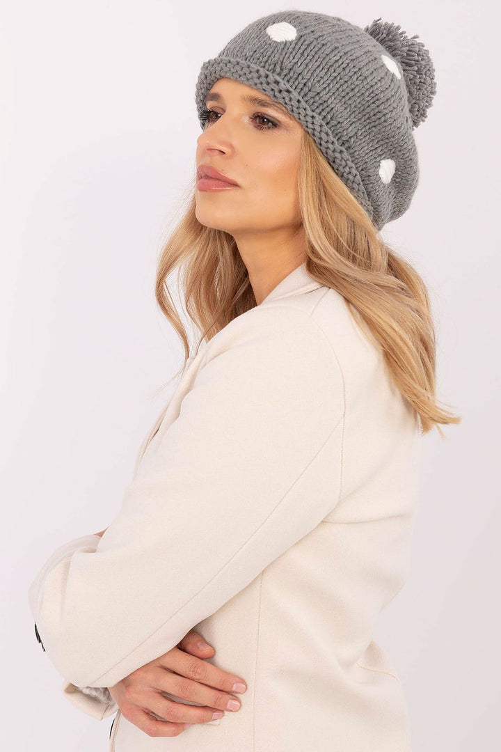 Cute and Stylish Winter Beanie with Decorative Dots and Pom-Pom - Ludowika 
