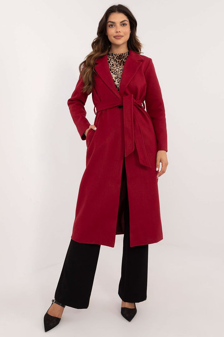 A versatile women's long transitional coat made from durable polyester, featuring a button closure, tie belt, and practical slip pockets. With a classic plain pattern, this uninsulated coat is perfect for autumn and spring, offering both style and comfort for casual, work, or formal occasions.






