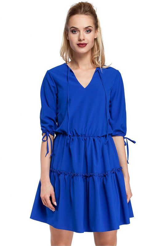 Boho-Inspired Ruffled Dress with Pleats and Tie Details