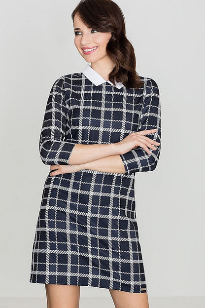 Classic midi dress featuring a geometric check pattern, decorative collar, and 3/4 sleeves. Ideal for work or casual everyday wear.