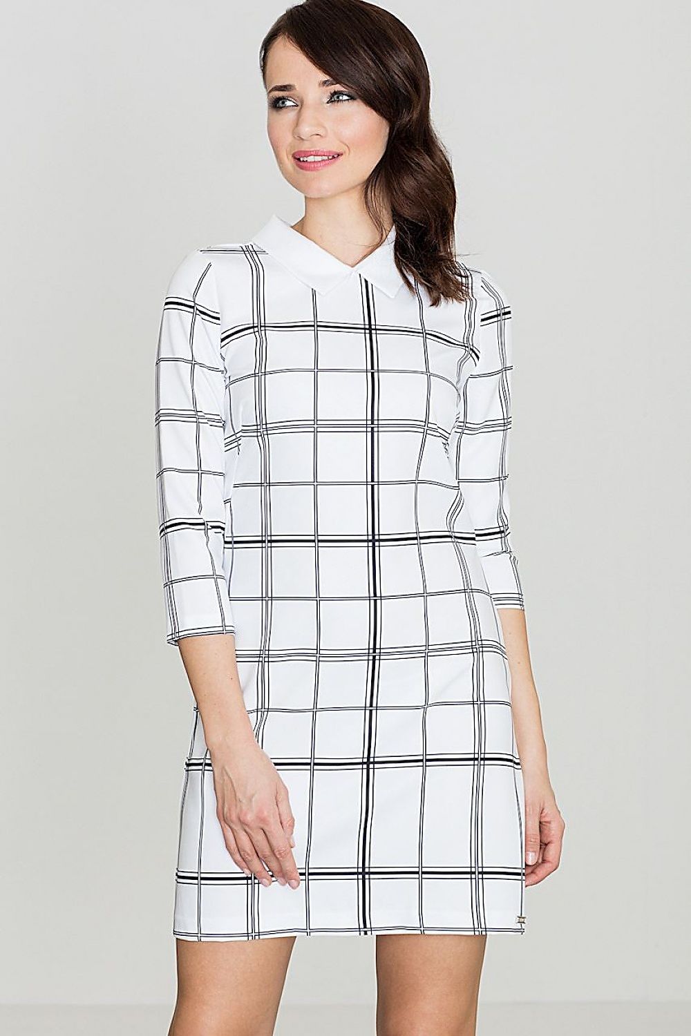 Classic midi dress featuring a geometric check pattern, decorative collar, and 3/4 sleeves. Ideal for work or casual everyday wear.