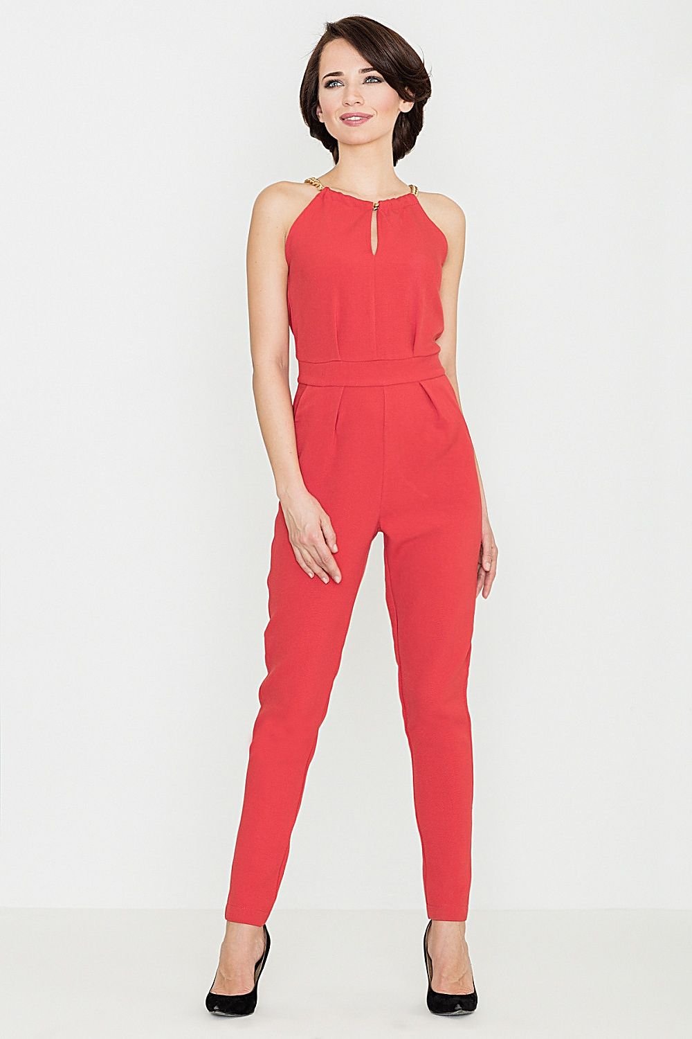 Elegant jumpsuit with long tapered legs, a half-round neckline featuring a chic chain detail, and a discreet back zipper, designed to flatter and elongate the silhouette.






