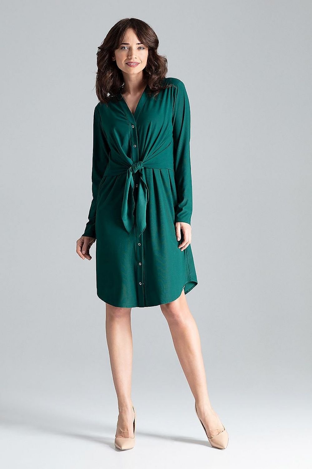 Elegant Shirt Dress with Waist Tie and Decorative Springs
Shirt dress with a tie at the waist fastened by decorative springs, featuring a cheese neckline and long straight sleeves. Designed to provide a flattering silhouette for women who wish to conceal figure imperfections.







