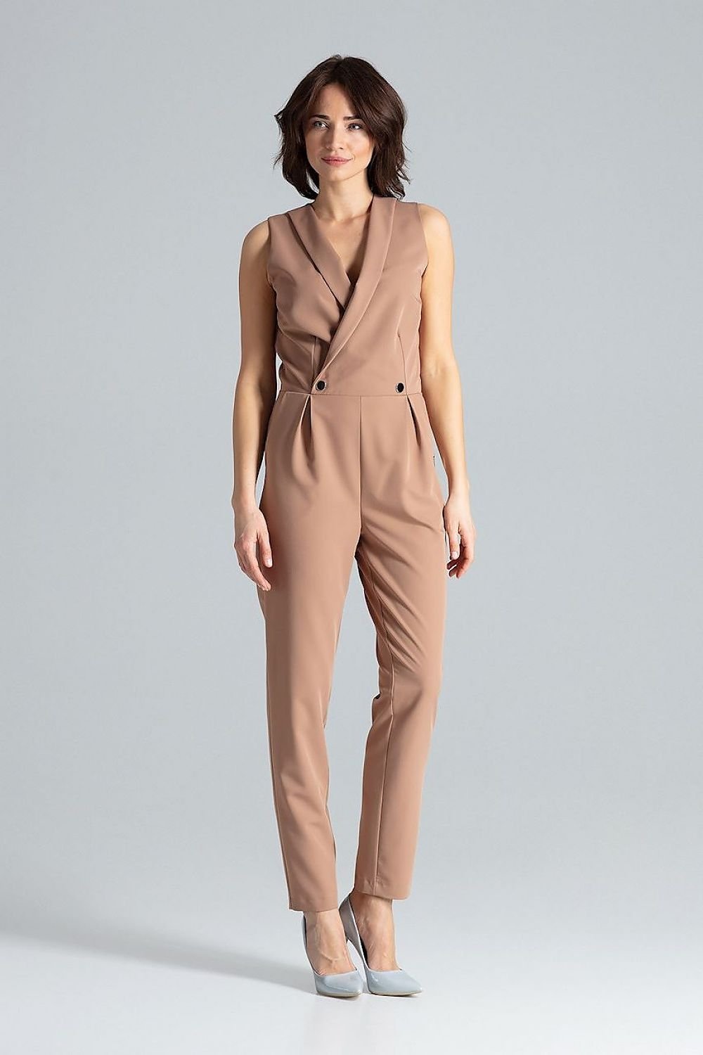 Classic sleeveless jumpsuit featuring lined narrow lapels, an envelope neckline, back zipper closure, waist darts, slanted side pockets, and silver-tone decorative snap fasteners.






