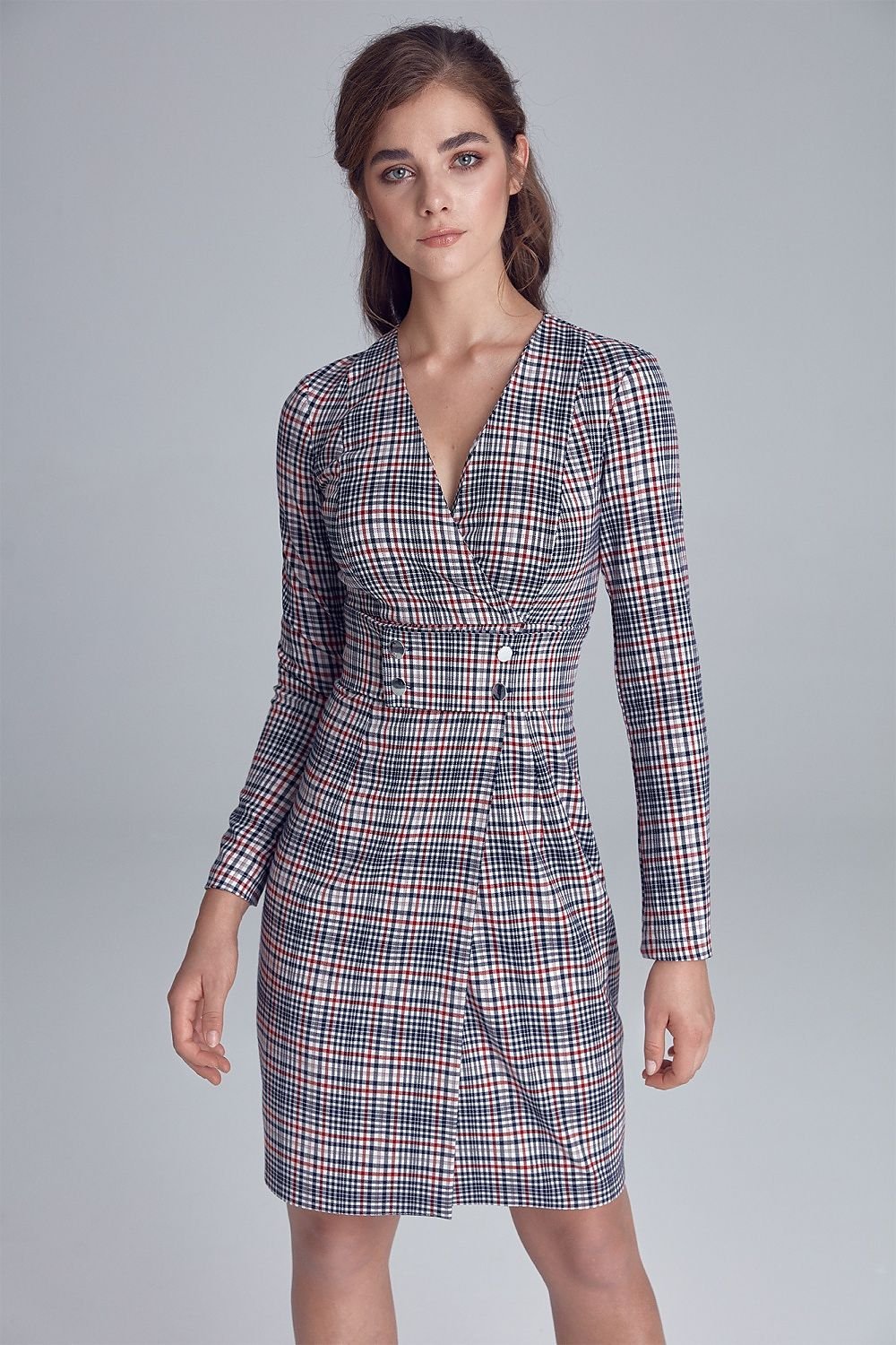 Elegant midi dress from the autumn collection, featuring a cut-off design under the bust with a press stud-decorated belt. The envelope neckline subtly emphasizes the bust. Made from soft, touchable fabric, perfect for work or outings. Unlined with a side zipper for ease of wear.