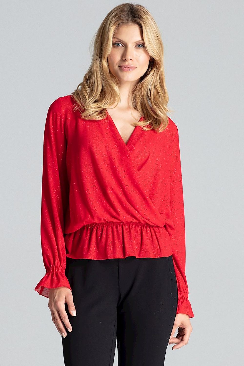  A brocade blouse with a slightly transparent fabric, featuring an envelope neckline, long sleeves, and elastic bands at the waist and cuffs for a flattering, comfortable fit.