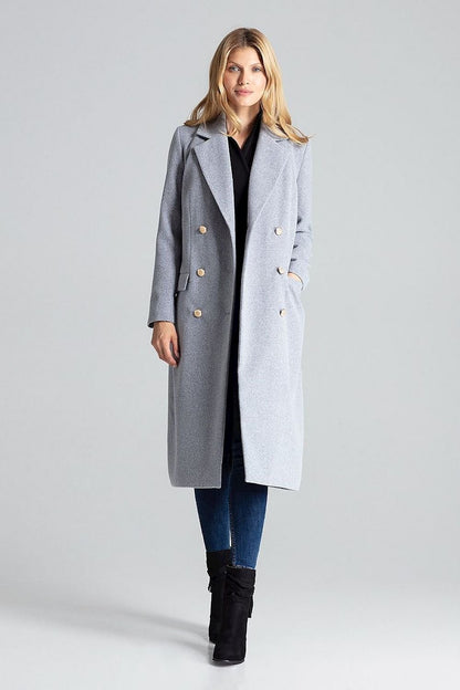 Manteau croisé bleu marine intemporel avec accents dorés