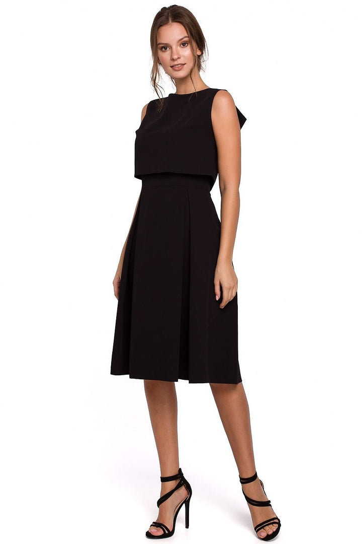 Modern Flared Dress with Exposed Back and Pleated Skirt - Ludowika 