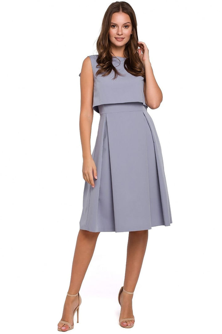Modern Flared Dress with Exposed Back and Pleated Skirt - Ludowika 