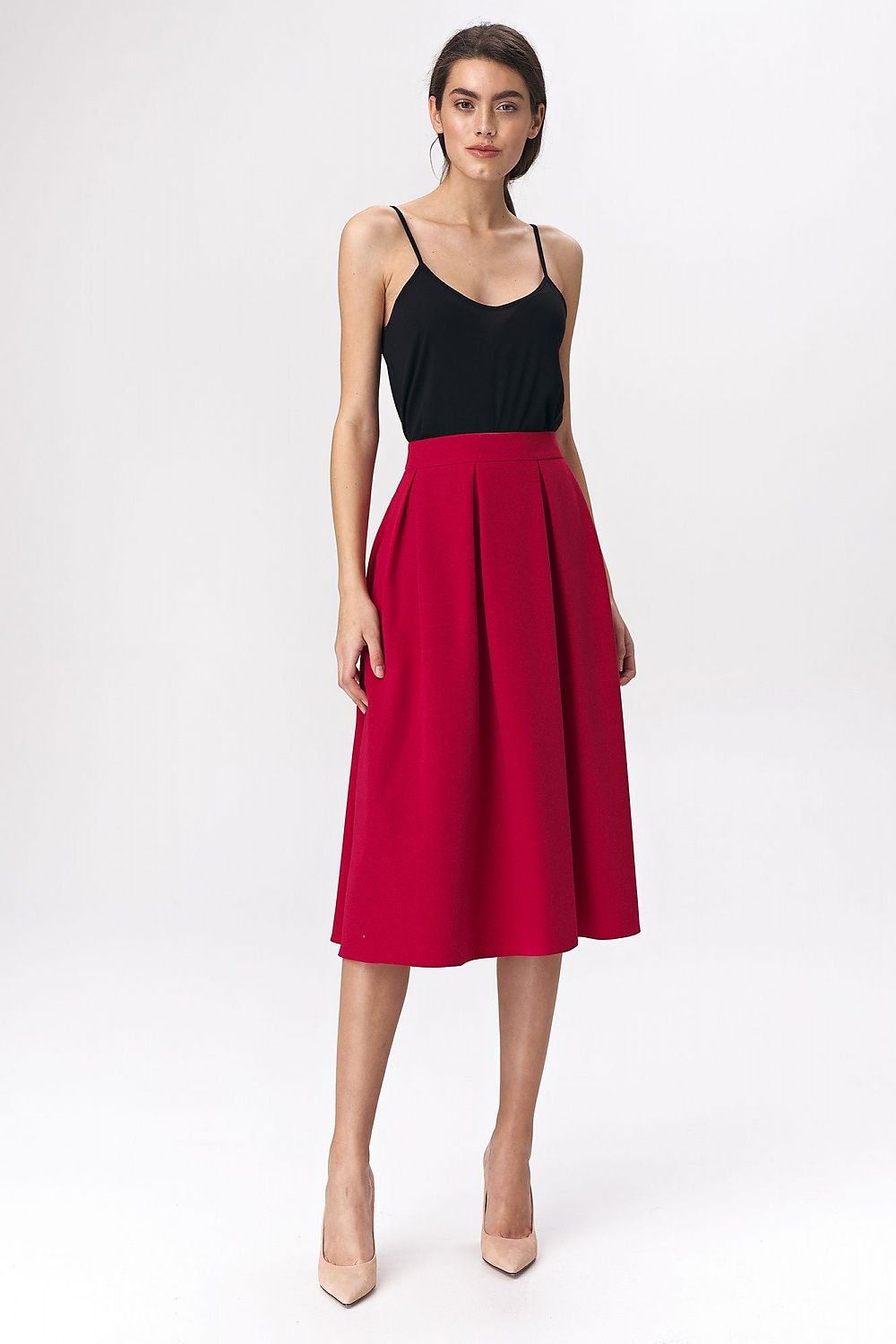 A wide flared midi skirt in vibrant fuchsia with a soft-touch fabric, back zip, and lining. Perfect for office or casual looks.

