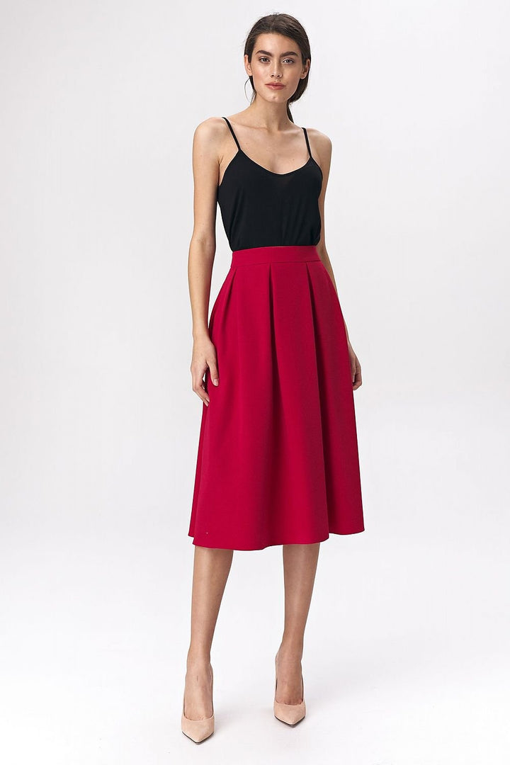 A wide flared midi skirt in vibrant fuchsia with a soft-touch fabric, back zip, and lining. Perfect for office or casual looks.

