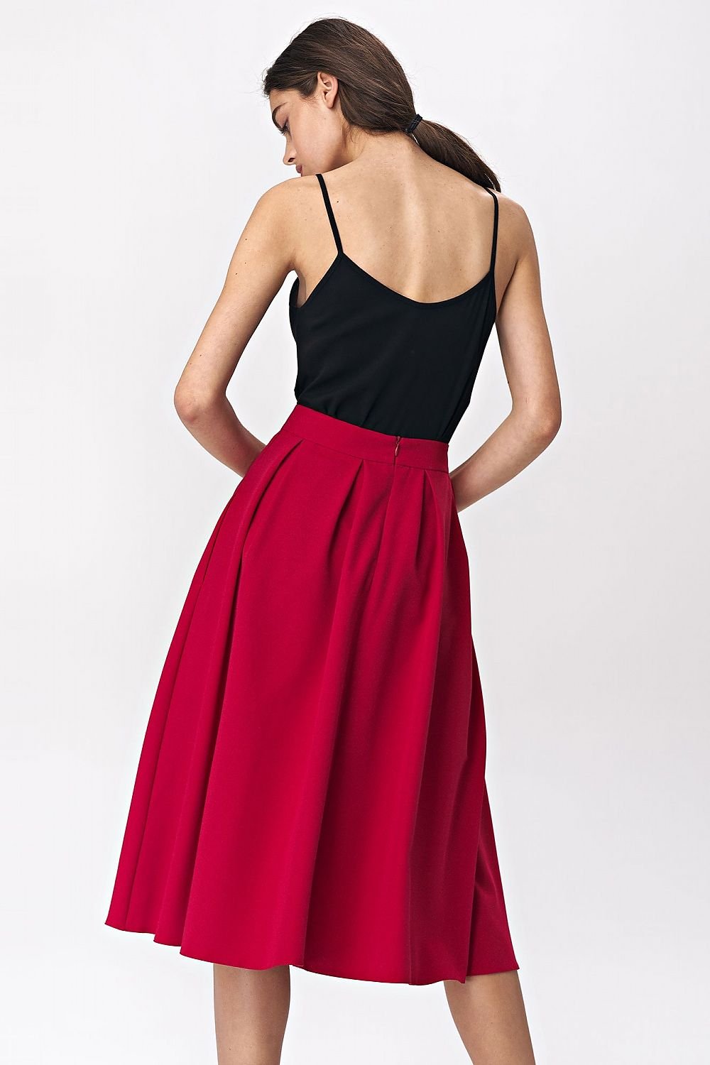 red wide flared midi skirt in vibrant fuchsia with a soft-touch fabric, back zip, and lining. Perfect for office or casual looks.

