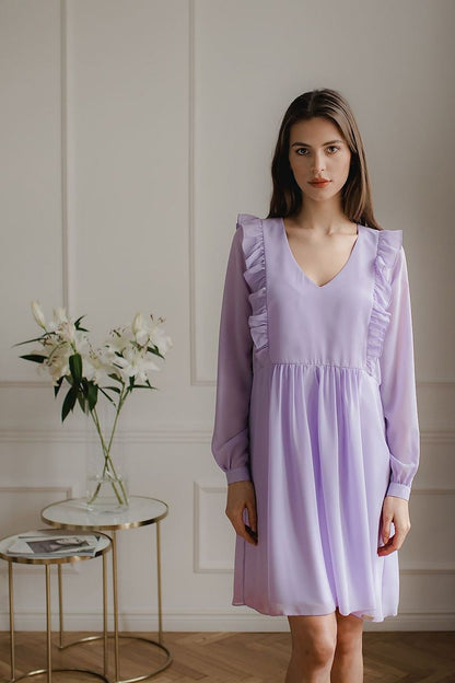 A loose-fitting flowing chiffon midi dress with long ruffled sleeves, button cuffs, a serek neckline, and decorative vertical frills on the front and back, seamed at the waist with a slip at the bottom, no fastening.






