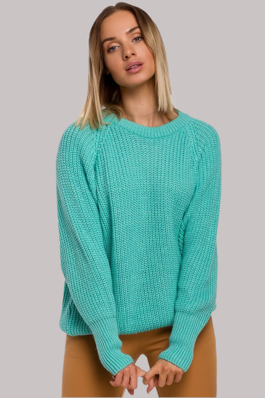 Elevate your everyday wardrobe with this timeless sweater, featuring a classic ribbed knit design. The wide sleeves add a contemporary touch, while the versatile neckline complements a variety of styles.

