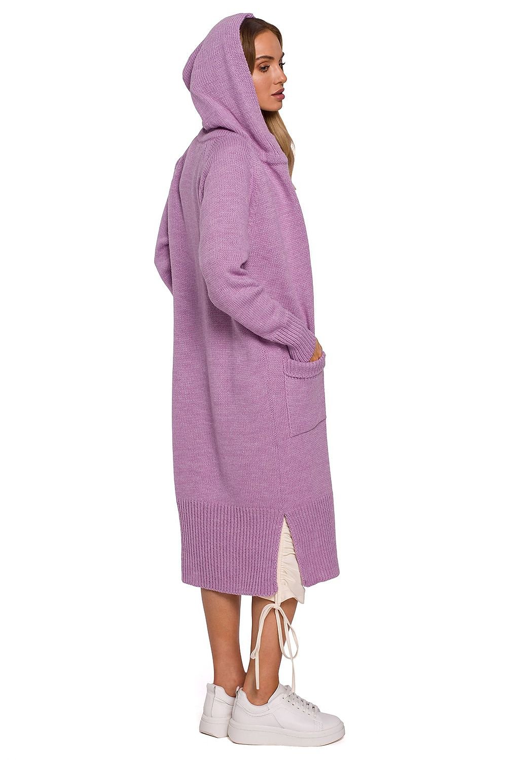 A cozy, coat-like cardigan made from soft yarn, featuring a large, fitted hood, two large front pockets with tabs, and decorative slits on the sides. Unbuttoned design for a relaxed, stylish look.