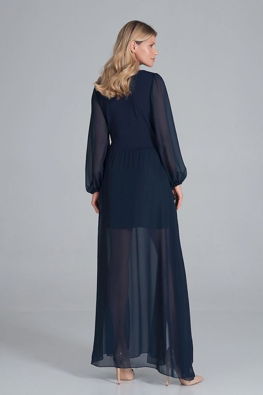 A cocktail maxi dress featuring an envelope neckline, long chiffon sleeves with bindings, and a two-layer bottom—mini dress underneath with a chiffon maxi layer featuring front slits for added elegance.






