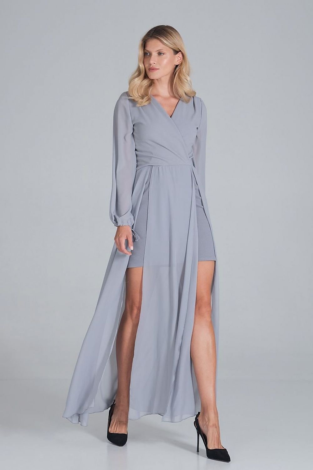 A cocktail maxi dress featuring an envelope neckline, long chiffon sleeves with bindings, and a two-layer bottom—mini dress underneath with a chiffon maxi layer featuring front slits for added elegance.






