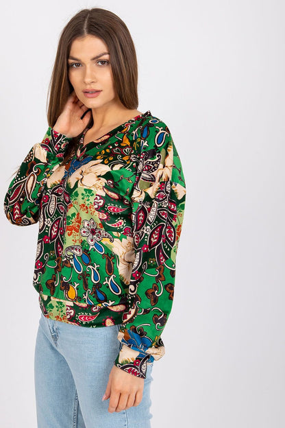 Chic long sleeve blouse with a V-neckline and unique fabric pattern, perfect for adding a touch of style to any occasion