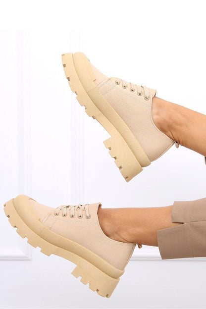 Stylish women's canvas trekking sneakers with thick soles, designed for those who love original, comfortable solutions. Made from fabric for both the outer and inner materials, these sneakers offer both style and durability, perfect for any adventure.






