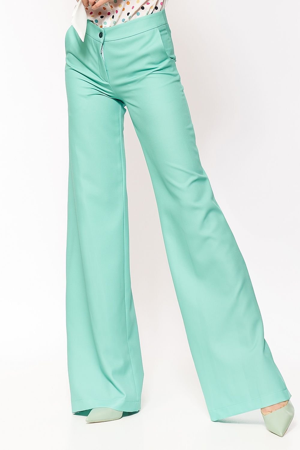 Pink palazzo pants with a touch of elastane for added comfort. Perfect for soft-office style, offering a fresh, non-traditional color that breaks classic office styling while providing a comfortable and stylish fit.

