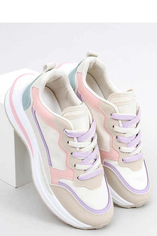 Chaussures de sport pour femmes sur semelle design avec lacets bicolores