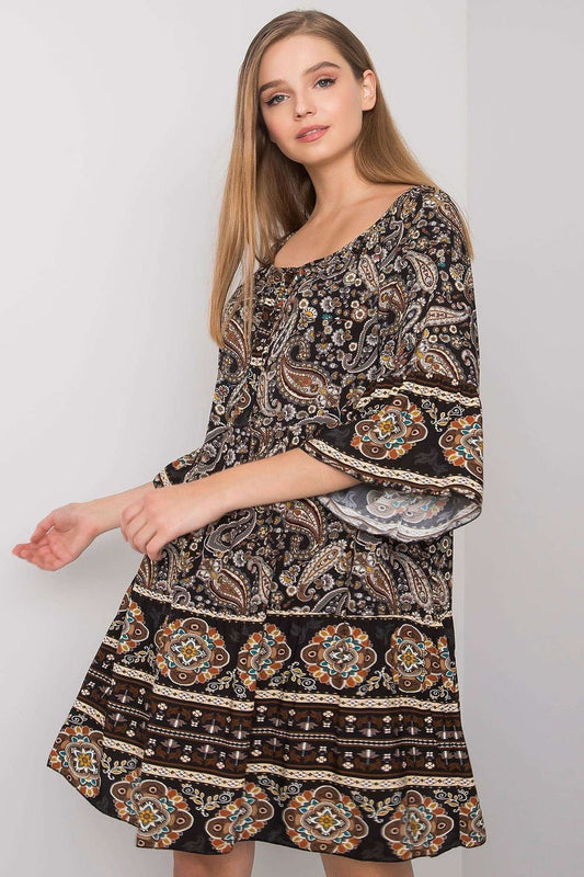 A floral print A-line dress with 3/4 sleeves and a round neckline, designed with a loose, relaxed fit for effortless style on various occasions.
